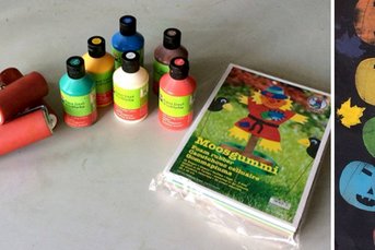 Bunte Farben und Malwerkzeuge liegen auf einem Tisch, während ein Moosgummi-Bastelset für kreative Projekte bereitsteht.